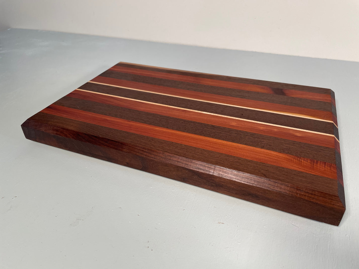 Maple striped Walnut & Cedar Cutting Board